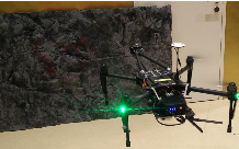 Onboard Real-time Dense Reconstruction of Large-scale Environments for UAV